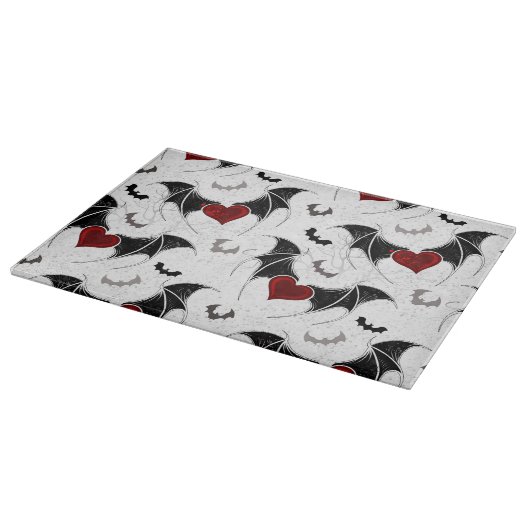 黒いこうもり翼を持つハロウィーンハート カッティングボード (角)