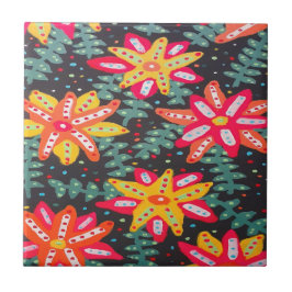 黒いはっきりした石のコーアに黄色とオレンジの花 タイル