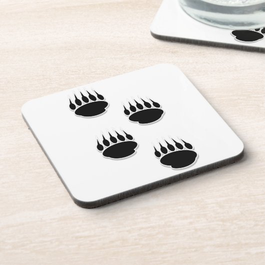 黒いクマの手のプリント コースター (左側)