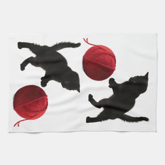 黒いシルエットの子猫と赤い毛糸のボール キッチンタオル (横)
