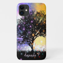 黒いシルエットツリーを持つ宇宙の虹の空