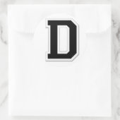 黒いシールでイニシャル文字Dを綴る ラウンドシール (バッグ)