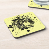 黒いスプラッシュを描いたチンパンジー コースター (左側)