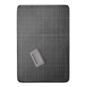 黒いタイルの床に灰色のバー石鹸 バスマット (正面縦)