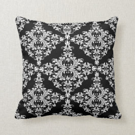 黒いダマスク織のフェミニンな白 クッション