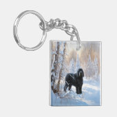 黒いテリアロシアのが雪のクリスマスを許した キーホルダー (正面左)