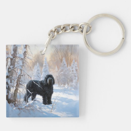 黒いテリアロシアのが雪のクリスマスを許した キーホルダー (裏面)