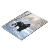 黒いテリアロシアのが雪のクリスマスを許した ノートブック (左側)