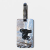 黒いテリアロシアのが雪のクリスマスを許した ラゲッジタグ (裏面縦)