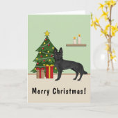 黒いドイツの羊飼いとフェスティバルクリスマスツリー カード (黄色い花)