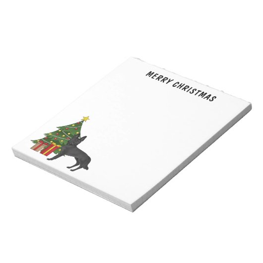 黒いドイツの羊飼いとフェスティバルクリスマスツリー ノートパッド (回転)