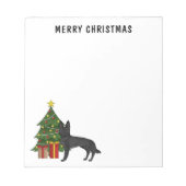 黒いドイツの羊飼いとフェスティバルクリスマスツリー ノートパッド (正面)