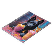 黒いドイツの羊飼いの子犬、アイスクリーム ノートブック (左側)