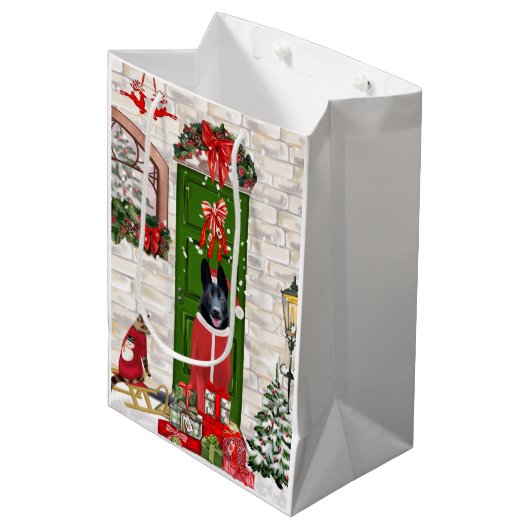 黒いドイツの羊飼い犬のクリスマス ミディアムペーパーバッグ (正面アングル)