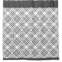 黒いドットで作られた幾何学的な4つのローブのパターン