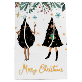 黒いドレスの黒人女性と黒いクリスマスツリーのパーティー ミディアムペーパーバッグ