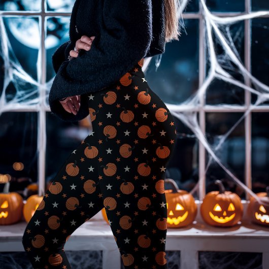 黒いハロウィンのカボチャと星 レギンス