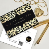 黒いフェイクギフト券の金ゴールドフレームの輝き