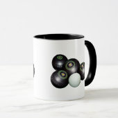 黒いボウリング玉が4つとキティ マグカップ (正面右)