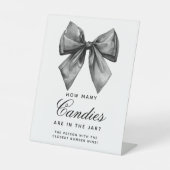 黒いモダン弓びんの中にキャンディーの数 台座サイン (正面)