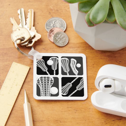 黒いラクロスの棒とボールのブロック キーホルダー (デスク)