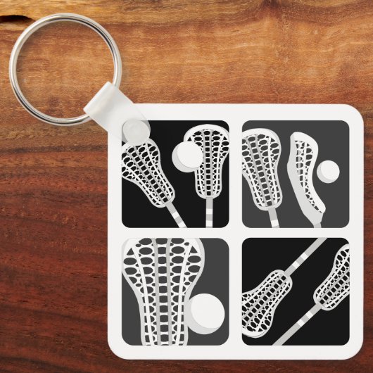 黒いラクロスの棒とボールのブロック キーホルダー (正面)