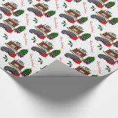 黒いラブラドル・レトリーバー犬のクリスマス ラッピングペーパー (角)