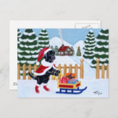 黒いラブラドールのクリスマスサンタ シーズンポストカード (正面/裏面)
