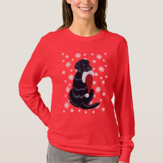黒いラブラドール及びサンタの帽子の雪片のクリスマス Tシャツ