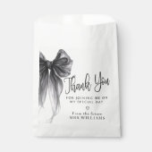 黒いリボンで結ばれたウェディングシャワーの感謝を伝える フェイバーバッグ (正面)