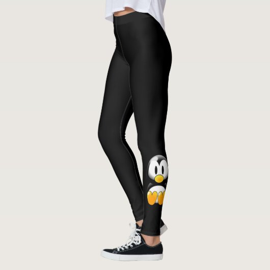 黒いレギンスのペンギン レギンス (左)