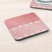 黒いレースが付いているピンクおよび白い背景 コースター (左側)