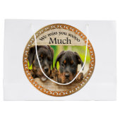 黒いロットワイラーかわいい子犬と悲しい顔 ラージペーパーバッグ (裏面)