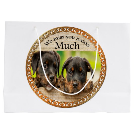 黒いロットワイラーかわいい子犬と悲しい顔 ラージペーパーバッグ (裏面)