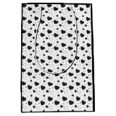 黒い光沢のあるハートかわいいロマンチックなパターン ミディアムペーパーバッグ (正面)