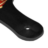 黒い切削ボード上の緑と金ゴールドのナツクラッカー カッティングボード (角)