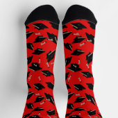 黒い卒業キャップが赤の上で空中に投げ ソックス (上部)