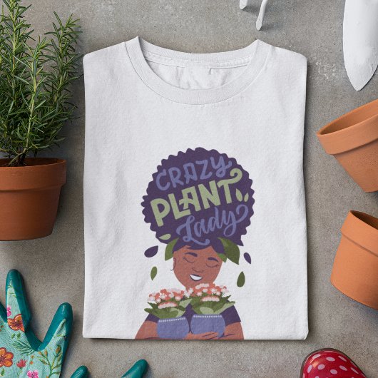 黒い女性熱狂する植物の女性、抱きしめている植物 Tシャツ