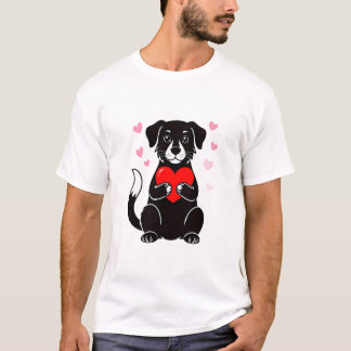 黒い子犬が赤いハートを持っている Tシャツ