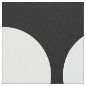 黒い幾何学模様の上の大きな白い水玉模様 ファブリック (クローズアップ)