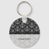 黒い幾何学模様の渦巻き形に白 キーホルダー (正面)