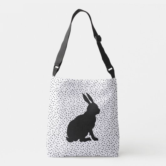 黒い座っているウサギのシルエット水玉模様白 クロスボディバッグ (裏面)