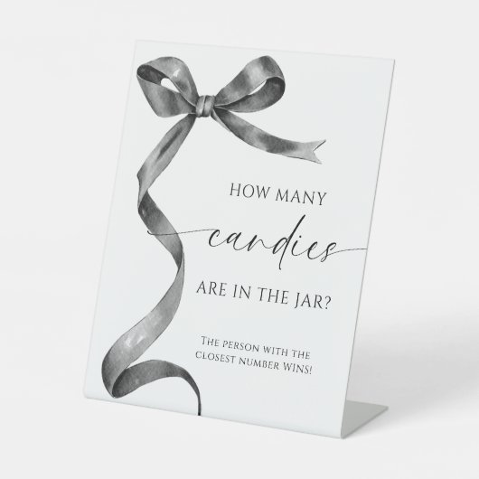 黒い弓びんの中にキャンディーが何個入っているか 台座サイン (正面)