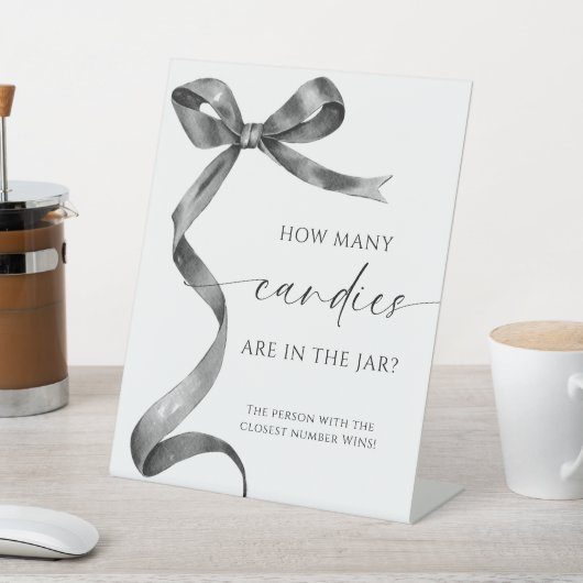 黒い弓びんの中にキャンディーが何個入っているか 台座サイン (インサイチュ)