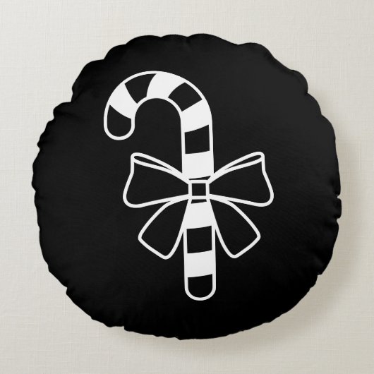 黒い弓を付けた白いミニマリストのキャンディーケーン ラウンドクッション (正面)