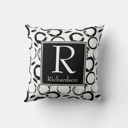 黒い抽象芸術モノグラムの円 クッション (裏面)
