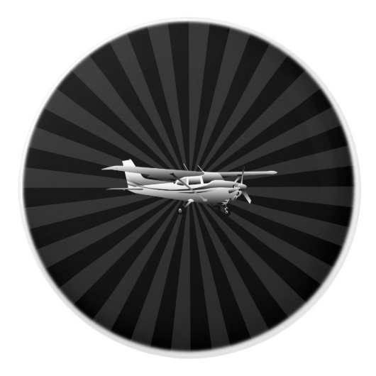 黒い日が差すことを飛ばす航空機のセスナのシルエット セラミックノブ (正面)