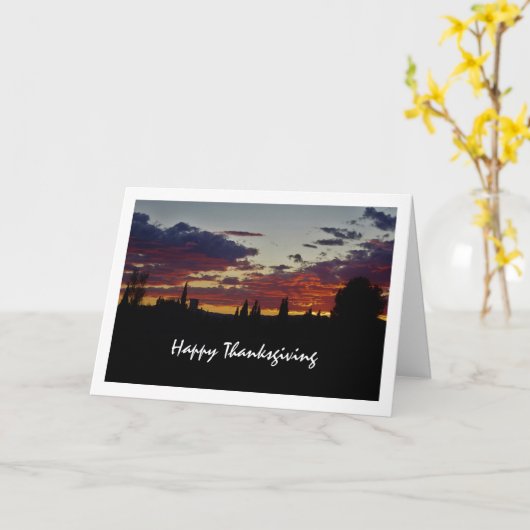 黒い木のシルエット 夕焼けの空 カード (黄色い花)