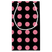 黒い渦巻形の背景にピンクの水玉模様 スモールペーパーバッグ (裏面)