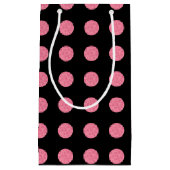 黒い渦巻形の背景にピンクの水玉模様 スモールペーパーバッグ (正面)